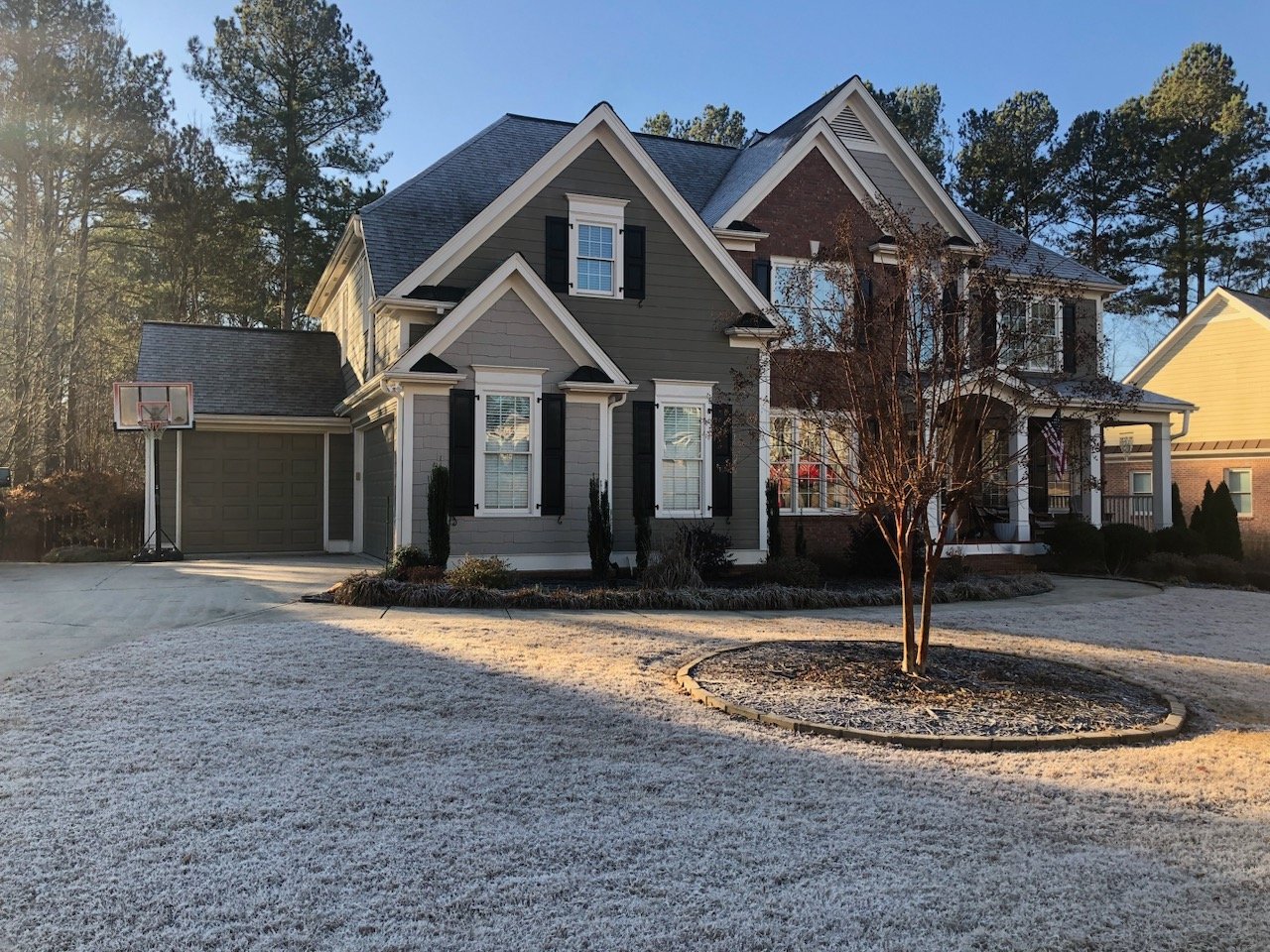 House with new gutters installed by Woodstock Gutters